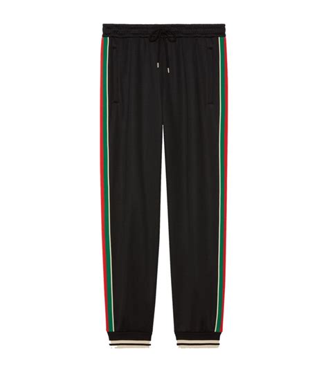 gucci pants plaid grey red stripe|Gucci sweatpants for women.